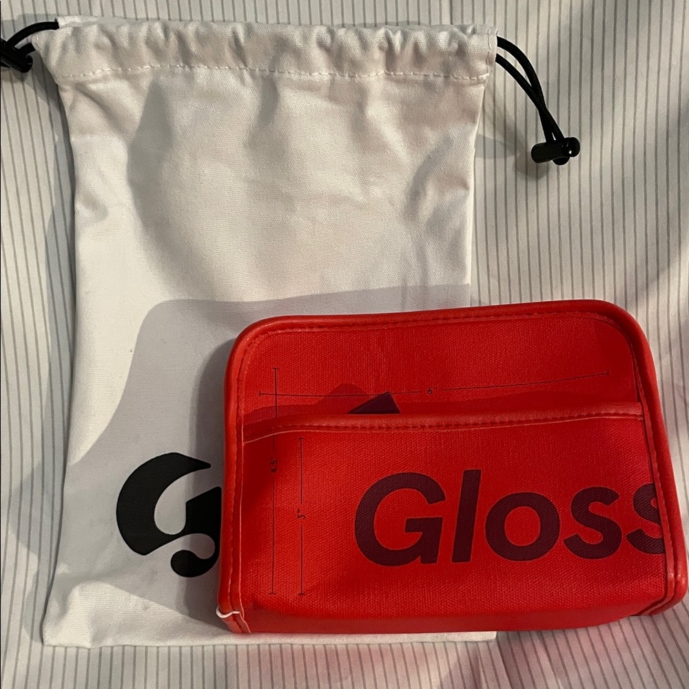 Glossier Orange Pouch with White Drawstring Bag